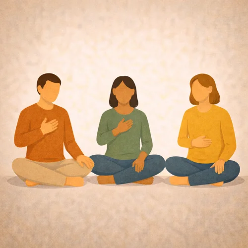 3 Erwachsene beiderlei Geschlechts im Schneidersitz